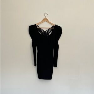 short black dress with strappy back and puff shoulder sleeves by bebe, size xs